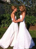 Chely Wright and Lauren Blitzer in their wedding gowns.