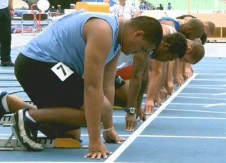 Sogelau Tuvalu was twice the size of the other six competitors and was the only athlete not wearing spikes on his shoes