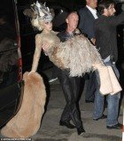Lady Gaga carried by the bodyguard as she couldn't walk in her block heels.
