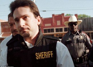 Lawrence Russell Brewer arriving at court in a bulletproof vest in 1999