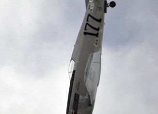 Picture of P-51 Mustang airplane taken moments before crashing at Reno Air Race shows the pilot is absent from the cockpit