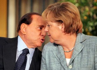 Silvio Berlusconi is accused of making insulting comments about Angela Merkel during a telephone conversation with a newspaper editor