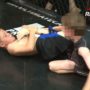 Little boys compete in cage fighting contest in UK.