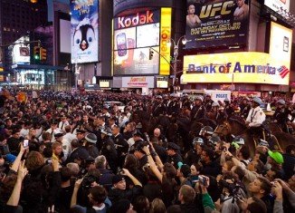 20,000 demonstrators swamped Times Square, stopping traffic, in what was thought to be the largest Occupy demonstration in the US so far
