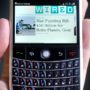BlackBerry offers free apps worth $100 to users hit by last week blackout.