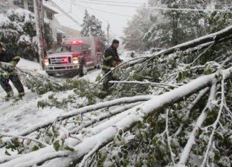 October snowstorm killed 3 people and left 2.3 M houses without power on East Coast.