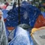 Occupy Wall Street protesters hit by snow in New York.