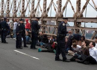 Police arrested more than 700 demonstrators from the Occupy Wall Street protests who took to the roadway as they tried to cross the Brooklyn Bridge