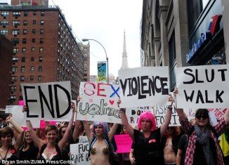 Protesters have taken the streets of New York today after it emerged the NYPD were warning women in Brooklyn to cover up in the face of sex attacks