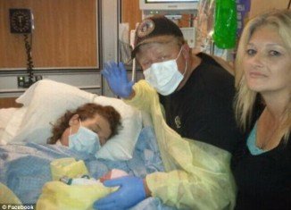 Stacie Crimm, assisted by her siblings, Ray and Elizabeth, meets her baby Dottie Mae before she passed away