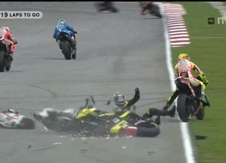 The Gresini Honda rider, Marco Simoncelli lost control of his bike on the second lap of the circuit in Sepang and appeared to be hit by Colin Edwards and then Valentino Rossi as he slid across the track