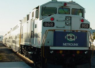 The woman pushing a baby stroller was struck and killed by a Metrolink passengers train in Riverside