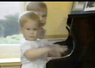 William and Harry were captured on film playing the piano, as they took part in a photo-shoot at Kensington Palace in 1985