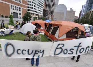 “Occupy Boston” demonstrators camping outside the Federal Reserve building