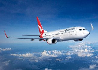 A Qantas pilot faces the prospect of losing his job after getting frisky with a first-class section female passenger on a long-haul flight between London and Sydney