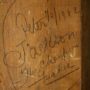 Filthy message dated 1902 scrawled on a wooden pillar of Kensington Palace
