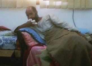 A picture apparently showing Saif al-Islam Gaddafi after his capture has appeared on the page of a Facebook group based in the Libyan town of Sabha