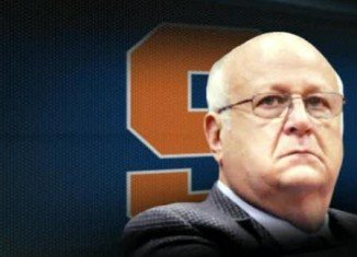 Bernie Fine, the Syracuse University basketball coach accused of sex abuse has been fired after damning new evidence suggested his wife watched him molest a boy who was staying at their house