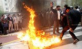 Iranian protesters in the capital, Tehran, have broken into the UK embassy compound during an anti-British demonstration