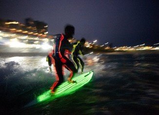17 Strongbow-sponsored surfers took to the water for the largest ever glow-in-the-dark surf attempt in front of hundreds of fans who lined Bondi Beach in Australia