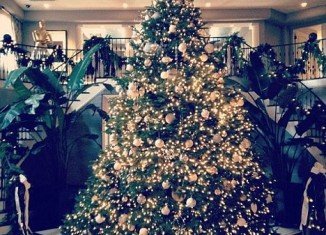 Kim Kardashian posted a picture of Kris Jenner's luxury ornament bedecked tree today, which looked very expensive and very neutral