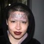 Drake fan tattooed rapper’s name across her forehead