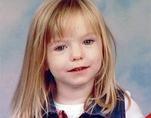 Two officers from Scotland Yard investigating the disappearance of Madeleine McCann have flown to Spain as part of a review into the case