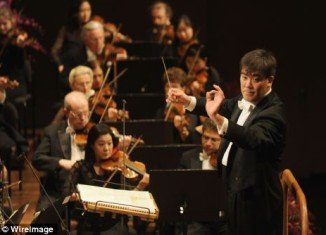 Alan Gilbert, the New York Philharmonic orchestra music director, stopped the orchestra in its tracks when a mobile phone went off during a performance