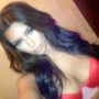 Kim Kardashian reveals her Kardashian Kollection lingerie and the new hair color on Twitter