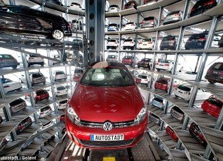 Volkswagen Autostadt CustomerCenter futuristic garages are the ultimate car showrooms with millions of dollars worth of new vehicles sitting in the stunning glass towers