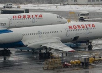 A Rossiya Airlines passenger jet which lost a wheel on take-off from Berlin has landed safely in St Petersburg