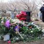 Whitney Houston grave covered by flowers