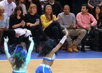 Beyoncé and Jay-Z made their first public appearance together since their daughter Blue Ivy was born at a basketball game