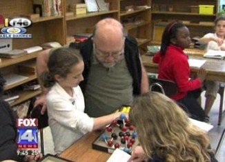 Clara Lazen of Kansas City was piecing together over-sized atoms from an educational model in her Border Star Montessori School classroom when she composed something her teacher had never seen before