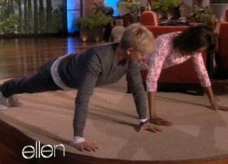 First Lady Michelle Obama was challenged to a push-up contest on Ellen DeGeneres show during her California tour for promoting her health agenda