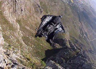 Jeb Corliss almost died after crashing into a cliff during a botched leap from Table Mountain in South Africa