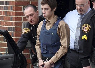 TJ Lane, 17, appeared for a preliminary hearing in court, at which prosecutors alleged that the teenager did not know his victims and chose them at random