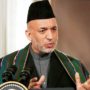 Hamid Karzai accuses US of not fully co-operating with a probe into the Kandahar massacre