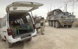 Afghan militants have launched an attack on a government delegation visiting the site where a US soldier killed 16 civilians