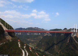 Aizhai Extra Large Suspension Bridge is now the world's highest and longest tunnel-to-tunnel bridge