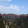Aizhai Extra Large Suspension Bridge, the world’s highest and longest tunnel-to-tunnel bridge, opens in China