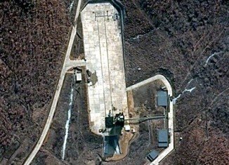 Japan announces that will shoot down a North Korean rocket if necessary, as new satellite images appeared to show preparations for the April launch