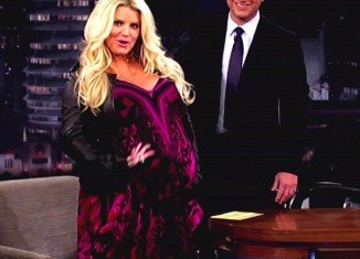Jessica Simpson has put her extremely blooming figure down to the fact that she has a lot of amniotic fluid