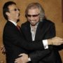 Robin Gibb showed signs of pulling through coma after brother Barry sang to him