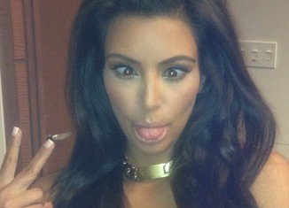 During The Kardashian Kollection launch at the Woodfield Mall in Schaumburg, Kim Kardashian posted several pictures of herself, including one of her pulling faces for the camera