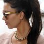 Kim Kardashian wearing Kanye West’s initials in her ear