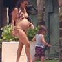 Bikini Kourtney Kardashian revealed her baby bump