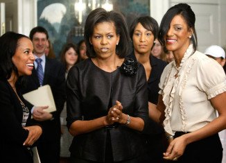 Michelle Obama has allegedly banned Kerry Washington (left) from the White House for being "too flirty" with Barack Obama