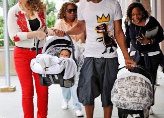 Nick Cannon was seen dressed in an outfit much younger than his years as he stepped out with Mariah Carey and their children
