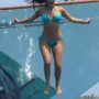 Kim Kardashian in aqua-blue bikini on a family trip to Dominican Republic